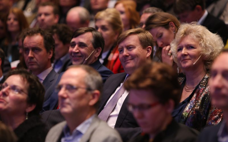 Sitting next to the King